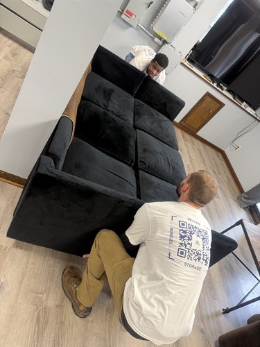 Gallery Image Dontea_and_Preston_lifting_a_couch.jpeg