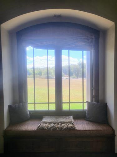 All 8 rooms have a window seat perfect for reading, each view is unique and looks out onto our lawn