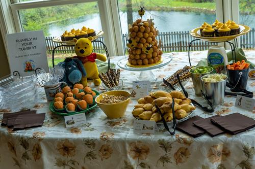 Chocolate covered "carrots" strawberries and "piglets" in a blanket rounded out this fun buffet with the addition of Tigger Tails for guests to enjoy.