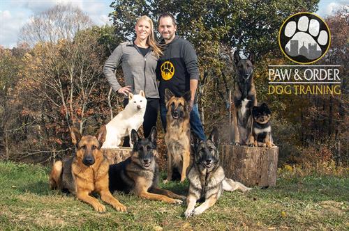 Paw & Order owners with their dogs