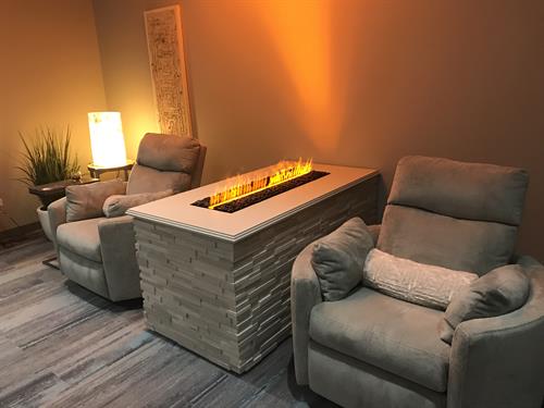 The Quiet Center offering an organic tea bar, aqua fireplace and cozy comfy recliners.