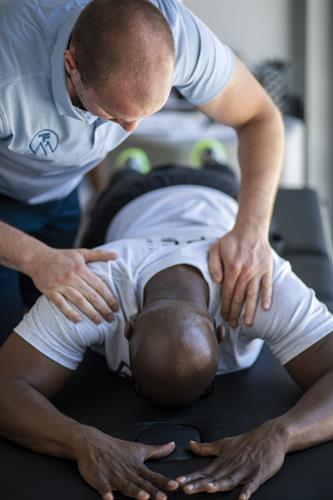Dr. Rasmussen assesses thoracic posture Dr. Rasmussen assesses thoracic posture