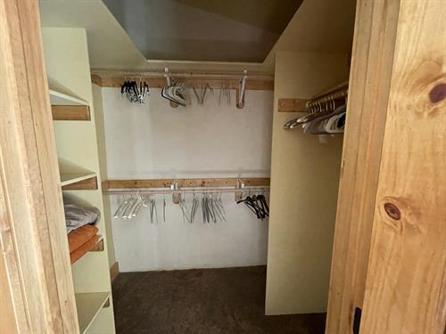 Huge walk in closet, stocked with extra bed linens and pillows, still has plenty of room for all of your clothing and gear.