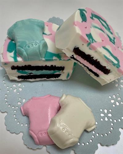 Baby gender reveal - bite into chocolate and pink or blue will reveal sex of baby
