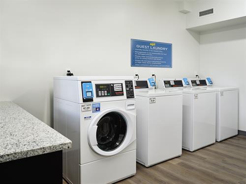 On-site laundry facility with washers and dryers that are equipped for credit card payment.