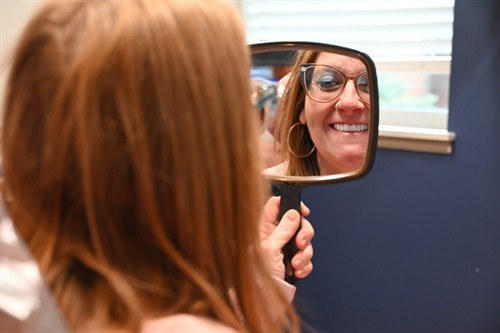 Secure Dental Davenport dental implant patient view their new smile.