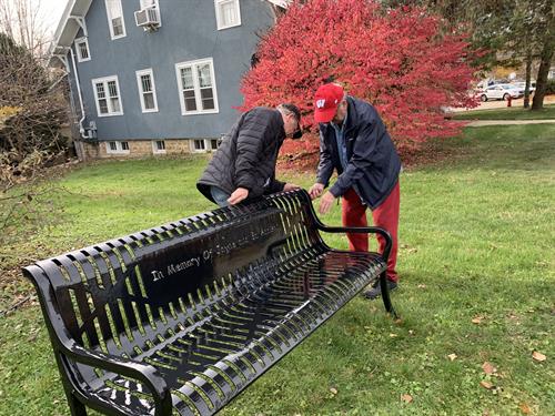 Installing the bench donated by the Ed and Jayne Addison family 2021