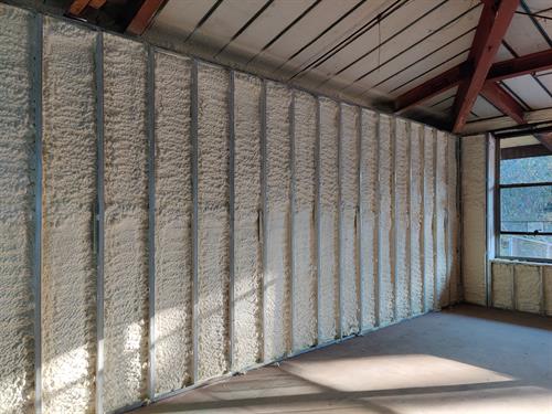 Spray Foam Insulation applied to the exterior walls with metal framing.