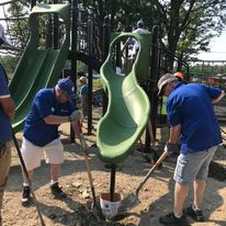 Helping build a playground at Chestnut Ridge Park