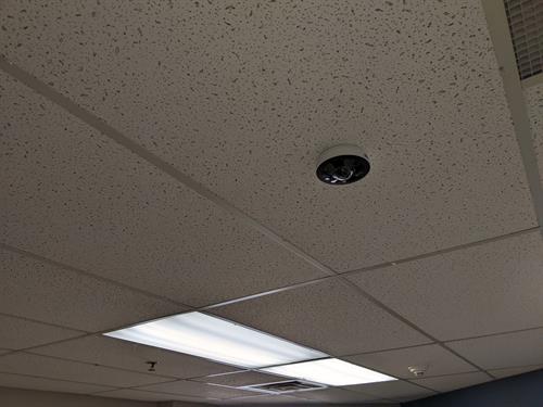 Camera on a ceiling tile