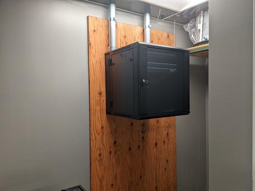 Data Cabinet hung on a fire rated backboard