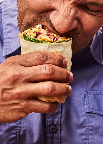 Gallery Image JustSalad_HoneyCrispyChickenWrap_Lifestyle.jpg