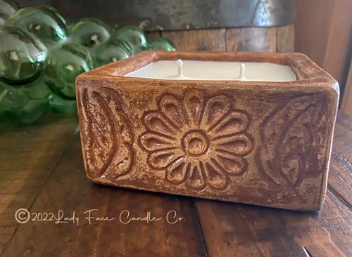 18oz, Rustic Mexico Clay- Elegant & Simple, natural and handmade and hand painted,  they make a beautiful decor piece once the candle has expired. 