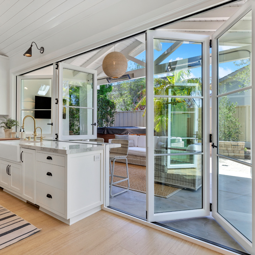 Combine a Bifold Door with a Bifold Pass-through window for a unique entertainment space