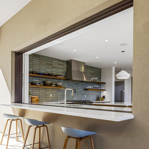 Multi-Slide Pass-Through Window disappears into the wall for virtually seamless counter space