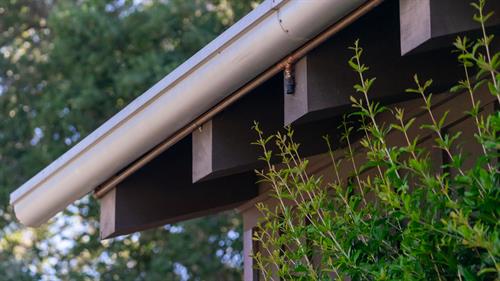 Frontline eaves sprinkler head close-up, showing seamless design for unobtrusive wildfire protection