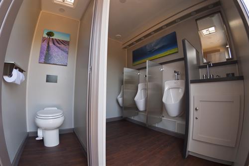 Mens Urinals & Stall inside the Premier Restroom Suite