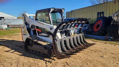 T590 Skid Steer with Grappler