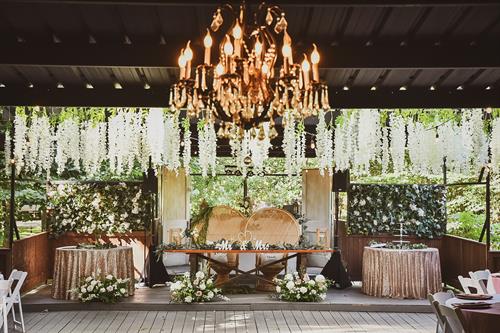 Our whimsical reception pavilion with hanging florals