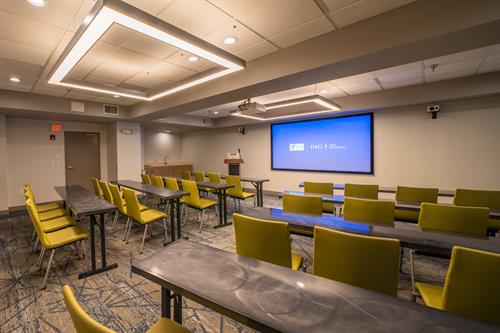 Our Meeting Room is versatile. Our most popular setups are Classroom, Theater, U-shape, and Boardroom. 