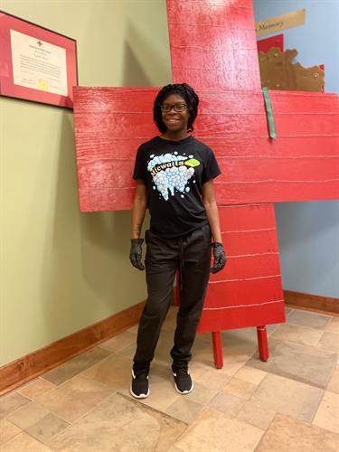 Cleaning crew member Katris at the American Red Cross Office Building