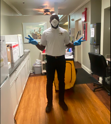 Cleaning crew member at Medical building