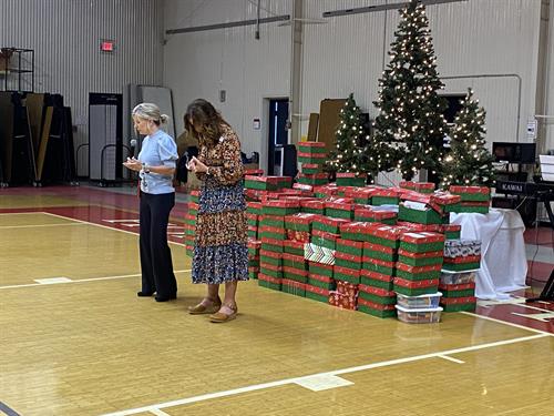 Praying over the OCC Shoeboxes