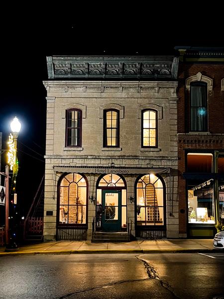 Historic Hotel Lanesboro's rounded windows just pop at night!