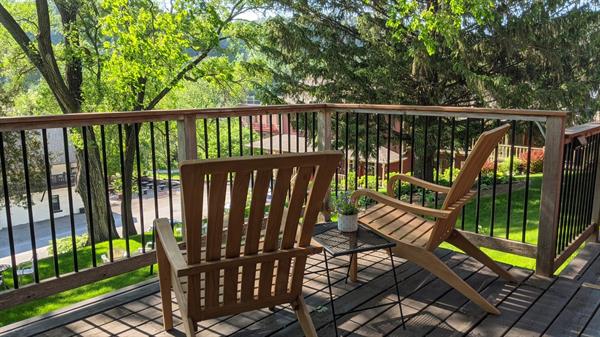 All Suites have a set of teak Adirondacks - relax & enjoy your time outdoors