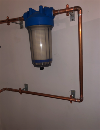 This is a basic whole house filter we installed on the watermain after the lawn sprinkle supply pipe.