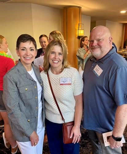 Sharilyn and her husband, Kevin with Penny Pennington, the General Partner at Edward Jones. 