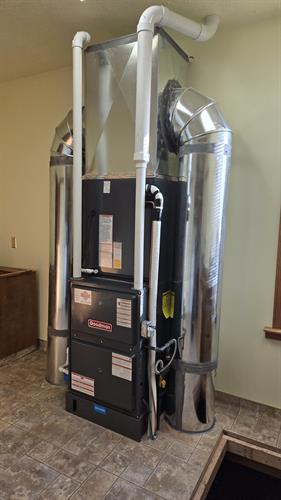 A very unique project. The customer requested that we bring the furnace out of the crawlspace while maintaining the current ductwork underneath the floor, 