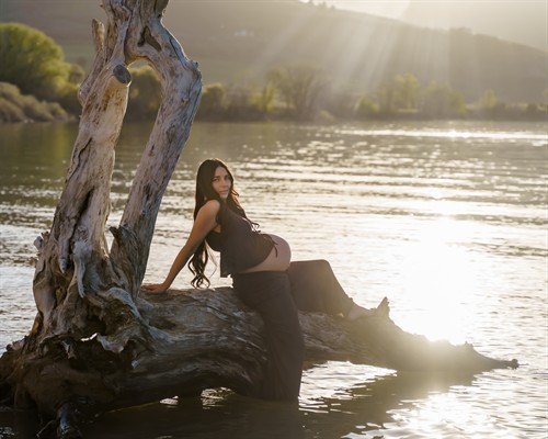 Maternity session by a lake.