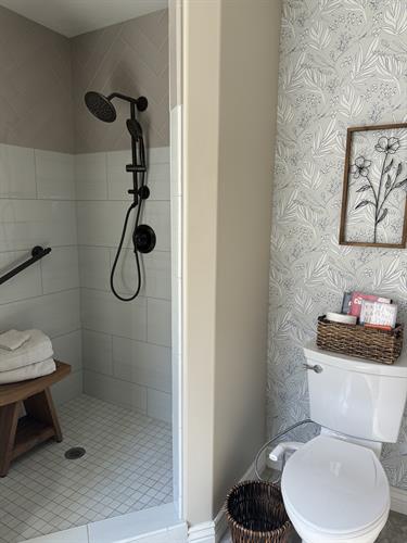 Bathroom Remodel with Tile Shower and Wallpaper Accent Bathroom Remodel with Tile Shower and Wallpaper Accent