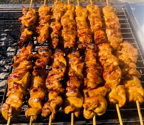 Filipino Satay. Tender Chicken marinated in Casian Spices before been grilled and based in a fusion of coconut, chili and peanut sauce.                                            