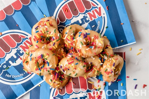 Hot - Fresh Mini Donuts customized with your favorite toppings! 