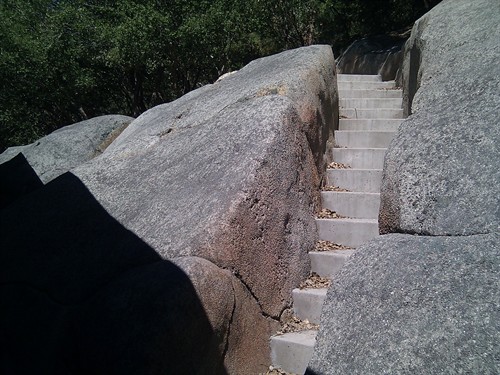 Engineered faux granite retention and concrete stairway
