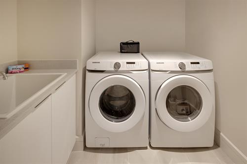Front Load Full Size Washer and Dryer in Every Residence