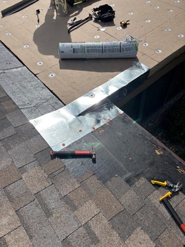 Flat roof replacement adding taper with ISO insulation board