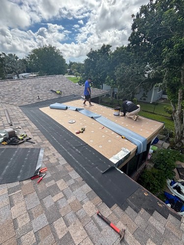 Flat roof replacement adding taper with ISO insulation board