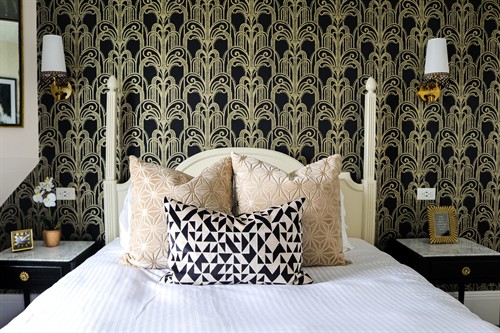 Gallery Image black_balcony_straight-on_view_of_bed.jpg
