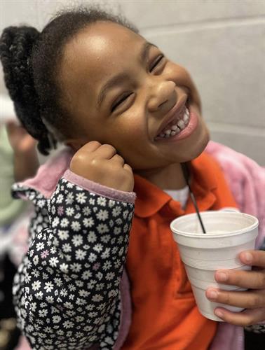 Our scholars enjoying a warm cup of hot chocolate.