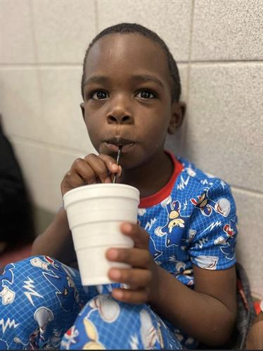 Our scholars enjoying a warm cup of hot chocolate.