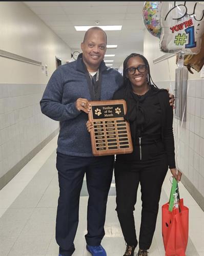 Our amazing director Mr. Andre' Mathews with our teacher of the month Ms. Brittany Clay.