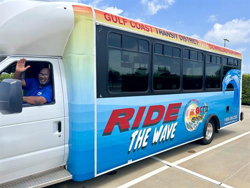 Gallery Image Ride_The_Wave_bus_with_driver.jpg