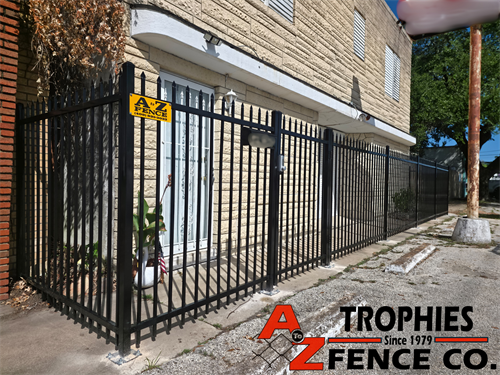 Black ornamental steel fence