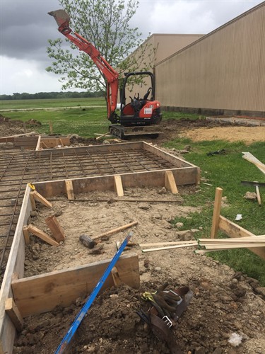 Space City Field Services building a concrete foundation 