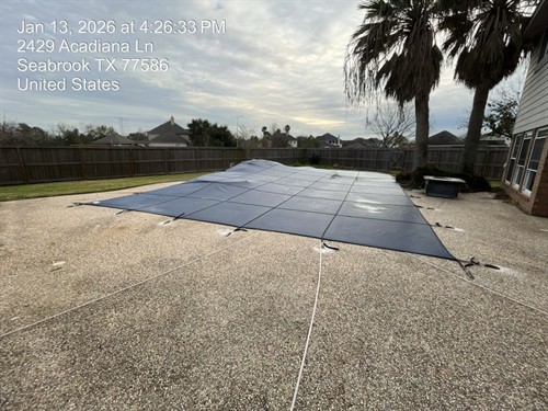 Space City Field Services installing a pool cover in Seabrook Tx