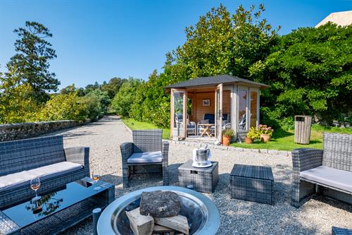 Summer House & Fire Pit on the Terraces at Pentillie Castle by Grey Dog Images