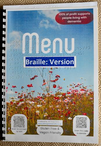 Our Braille Menu folder. These are double fronted with the Braille version on one side and Large Print version on the other. As seen on our website.